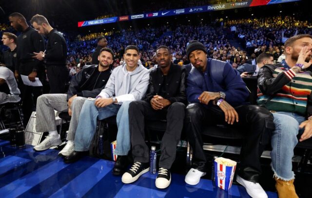 PARIS, FRANCE - JANUARY 23: Gon�alo Ramos, Achraf Hakimi, Ousmane Demb�l�, and Presnel Kimpembe attend the game between the San Antonio Spurs and the Indiana Pacers on January 23, 2025 at The Accor Arena in Paris, France. NOTE TO USER: User expressly acknowledges and agrees that, by downloading and or using this Photograph, user is consenting to the terms and conditions of the Getty Images License Agreement. Mandatory Copyright Notice: Copyright 2025 NBAE   Catherine Steenkeste/NBAE via Getty Images/AFP (Photo by Catherine Steenkeste / NBAE / Getty Images / Getty Images via AFP)